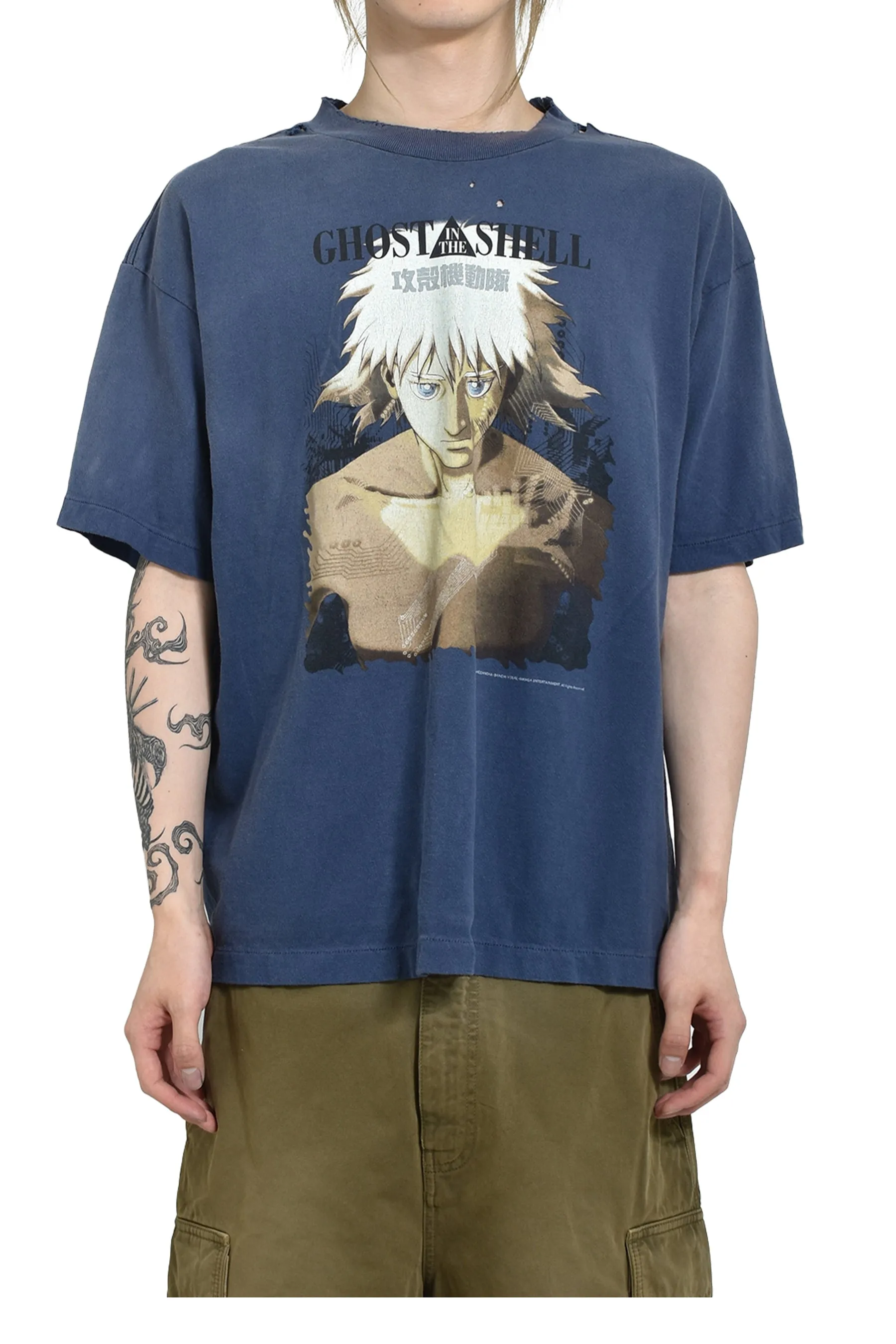 SAINT Mxxxxxx × Ghost in the Shell GS_SS TEE/GST IN THE SHELL/NVY Ghost in the Shell co-branded distressed short-sleeves White-haired plain character TEE Washed blue S-XL Look for the cylindrical fabric with no side seams. The open width is almost meaningless Asut ready-made garments dyed The whole piece is sprayed with horsetail. The collar and cuffs are faded. The collar and cuffs are frayed. Many hangings are worn. The oversized printing position restores the authenticity level. Customized joint main mark/wash mark/with little angel anti-counterfeiting mark
